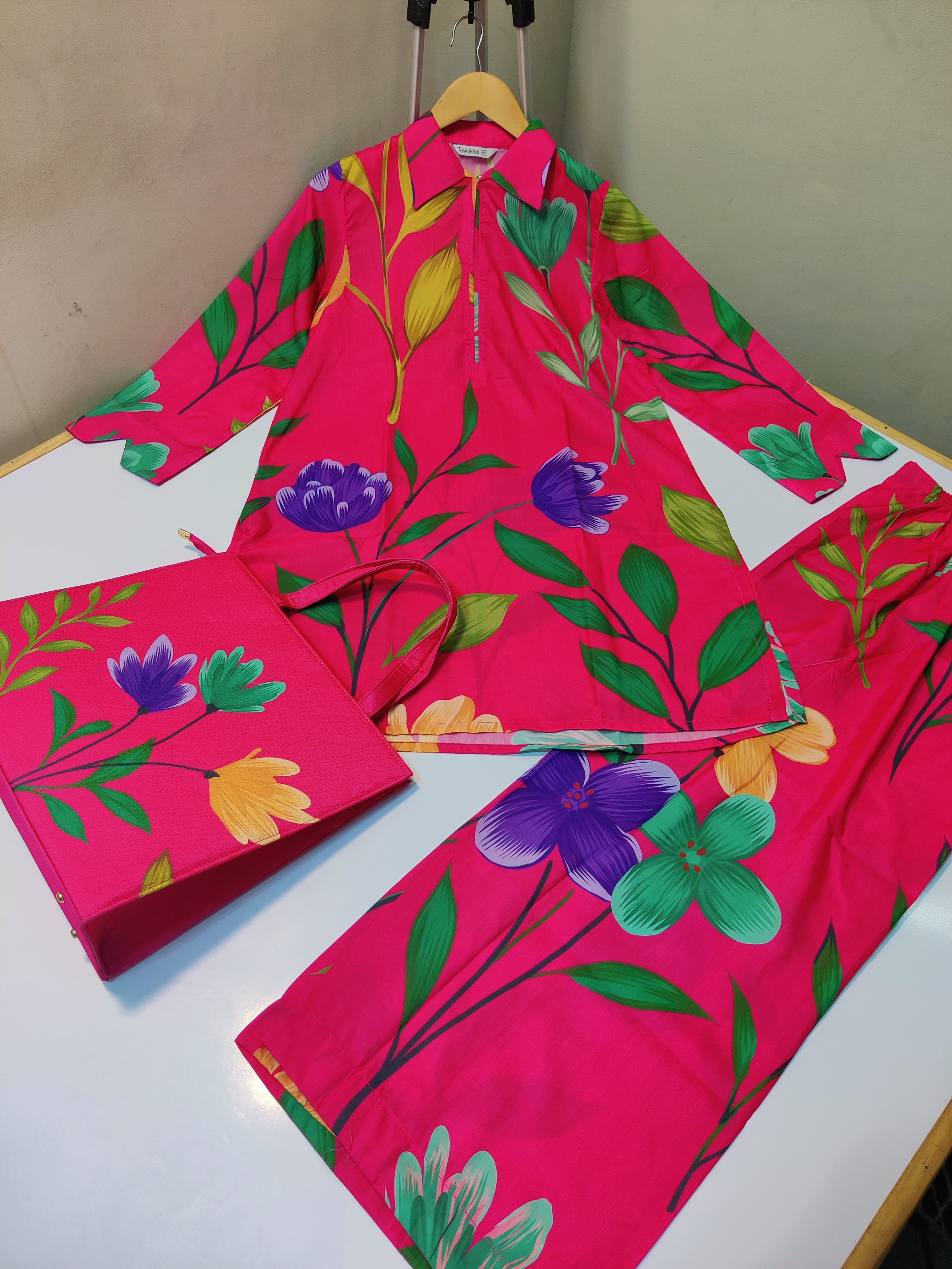 Women swiss fabric suits with same print hand bag